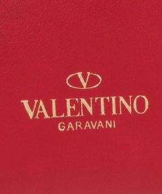 a red bag with the word valentino garavanii on it