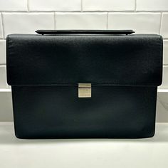 Louis Vuitton Taiga Porte Document Angara Briefcase Ardoise In Excellent Condition. No Rubbing Or Scratches. There Is One Little Dot On The Buckle, See Photo. Louis Vuitton Mens Briefcase, Bags Louis Vuitton, Louis Vuitton Black, Louis Vuitton Bags, Louis Vuitton, Buckle, Man Shop, Black