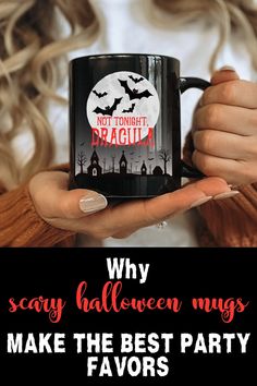 a woman holding a coffee mug with the words why scary halloween mugs make the best party favors