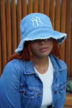 Step up your street style with the NY Denim Bucket Hat. Crafted from durable denim, this hat brings a trendy, laid-back vibe to any outfit. Perfect for casual outings or adding an edge to your everyday look, the NY Denim Bucket Hat is a must-have for those who love effortless cool. Due to lighting and editing, color may vary on actual product. **Before placing your order, please review and agree to our terms and conditions: - We are unable to ship to PO Box addresses. - Due to health protocols, we are unable to process returns or exchanges. *Please double check your order before submitting. If you have any additional questions, please reach out to us. Thank you. Bucket Hat Aesthetic, Health Protocols, Hat Aesthetic, Denim Bucket Hat, Fisherman's Hat, Bucket Hat Black, Denim Hat, Fishing Hat, Beach Hat