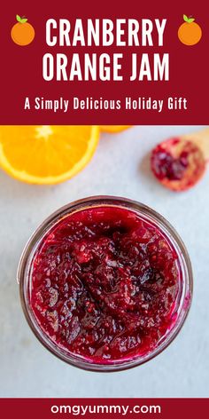 cranberry orange jam in a glass bowl next to an orange slice with the title overlay