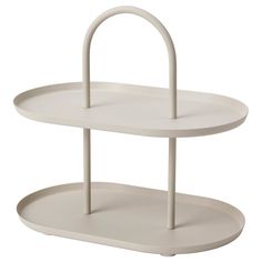 two tiered serving trays with handles on each side, one white and the other beige