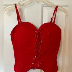 Nwt Biker Chic Vibes! 13” From Top Of Bust To Bottom, P2p 16” (With Stretch), Adj Straps, Lovely Inflated Lace. Zip Back And Adj Front! Very Stretchy! Gotta Luv This One! Red Party Corset With Built-in Bra, Red Summer Corset With Built-in Bra, Red Tank Top With Adjustable Straps, Red Tank Top With Straps For Party, Red Crop Top With Spaghetti Straps For Party, Red Camisole Tank Top With Straps, Red Fitted Tank Top With Adjustable Straps, Red Tops With Built-in Bra And Tank Straps, Fitted Red Summer Camisole