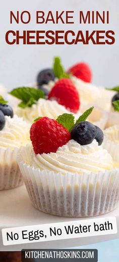 no bake mini cheesecakes with white frosting and fresh berries on top