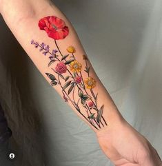 a person with a flower tattoo on their arm