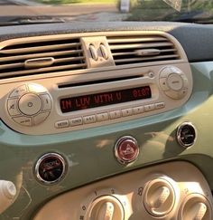 there is a radio in the dashboard of a car