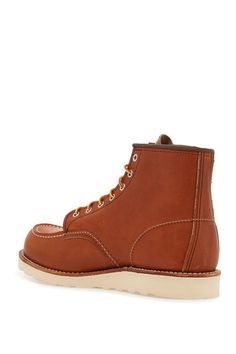 Red Wing Classic Moc Toe ankle boots in Oro-Legacy smooth leather, featuring iconic Moc toe and Traction Tred rubber sole. Contrasting stitching, trekking laces, silver-tone metal eyelets, unlined interior with leather insole. Composition: 100% calf leather