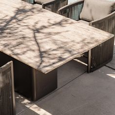 Inspired by minimal center plinth dining tables, we engineered our extruded aluminum to achieve this look as an exercise in simplicity and bold geometry. A singular hollow plinth of extruded aluminum with gentle curved edges supports the beveled top engineered in Travertine stone – supported by our aluminum honeycomb sub structure for support and resilience. A perfect and timless table with seating for many• Frame handcrafted of extruded aluminum in our workshop • Superior quality powder coating Aluminum Crafts, Stone Coffee Table, Outdoor Stone, Travertine Stone, Rectangle Dining Table, Aluminum Furniture, Outdoor Cover, Outdoor Material, Stone Feature