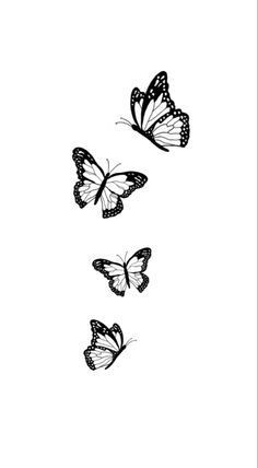 three butterflies flying in the sky with black and white ink on it's wings