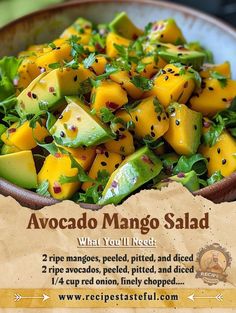 a bowl filled with sliced up mangos on top of a wooden table next to a sign