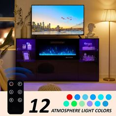 a living room with a large television on top of it's entertainment center and colorful lights in front of the tv