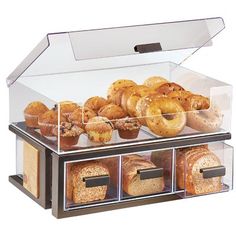 a bakery display case filled with lots of donuts and muffins in it