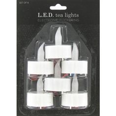 white tea lights in plastic packaging