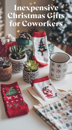 Festive scene displaying Christmas gift ideas for coworkers: decorative socks with holiday motifs, small potted succulents, and a patterned mug. Small Gift Ideas For Coworkers Christmas, Budget Christmas Gifts For Friends, Simple Co Worker Christmas Gift, Gifts For Co Workers For Christmas, Christmas Gift Ideas On A Budget, Cheap Co Worker Christmas Gift Ideas, Small Holiday Gifts For Coworkers, Co Worker Christmas Gift Ideas Under $10, Small Coworker Christmas Gifts