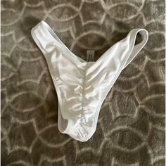 White Bikini Bottoms. New, Never Worn. Size Small. Cheeky, Ruched Back. White Ruched Beach Bottoms, White Ruched Bottoms For Beach, White Ruched Summer Bottoms, White Ruched Bottoms For Vacation, White Ruched Vacation Bottoms, Vacation White Ruched Bottoms, Womens Swim, Color White, Pants