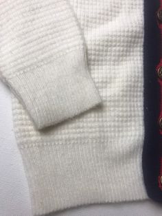 "1950s Roy Togs acrylic sweater.Pit to pit 11 3/4\"/pit to wrist 9 1/2\"/ length 13\"/Smoke free environment /straight out of the 50s/Only issue as seen in last picture is a tiny spot/ (29)" White Wool Sweater With Button Closure, Retro White Sweater With Buttons, White Retro Sweater With Buttons, Polly Flinders Dresses, Vintage Toddler Dress, Boys Cardigans, Vintage Girls Dresses, Boy Boy, Acrylic Sweater