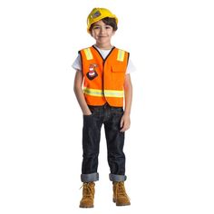 a young boy wearing an orange safety vest and yellow hard hat standing in front of a white background