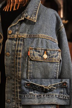 "This is a reproduction made by Levi of a Levi's Type 2 woman's Denim Jean Jacket. Pleated front. I has the buttons on the woman's side. It is in Excellent Vintage condition. The only thing I see is a small discoloration on the back. Western Styled Ranch wear.and made in the USA. The photographs that should be considered part of the description. No bad smells or damage. 2 top pockets and a Cinch Buckle Back with Gussets. It is a Medium but these jackets ran large so you should have a close look Denim Jacket With Pockets For Rodeo, Dark Wash Denim Jacket With Pockets For Rodeo, Vintage Medium Wash Denim Jacket For Rodeo, Vintage Levi's Outerwear In Medium Wash, Mechanic Coveralls, Vintage Levi’s Button-up Denim Jacket, Vintage Single-breasted Dark Wash Denim Jacket, Western Suits, Vintage Pre-washed Medium Wash Denim Jacket