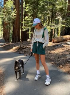 Unleash your inner fashionista on the trails with these stylish hiking outfits for women! Whether it's spring or summer, these cute looks will elevate your outdoor experience. For example, we love this casual ensemble with green shorts, which also doubles up as a dog walking outfit! Hiking Outfits Aesthetic, Cute Hiking Fits, Outdoorsy Outfits Summer, Hike Outfit Summer, Summer Hiking Outfit Women, Casual Hiking Outfit