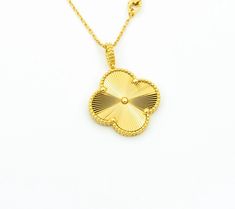 Luck will always be on your side with our Vintage Clover Pendant Necklace in Gold. Show off your unique style with this one-of-a-kind piece that adds a touch of elegance and charm to any outfit. A perfect gift for someone special (or yourself!), this necklace is sure to bring good fortune wherever you go. Who needs a four-leaf clover when you have this stunning pendant around your neck? Go ahead, make a statement and embrace your inner fashionista! ADDITIONAL INFORMATION Color: Gold Stone: no Re Luxury Gold Jewelry With Large Pendant, Classic Gold Necklaces With Large Pendant, Classic Gold Necklace With Large Pendant, Gold Necklace With Large Pendant, Timeless Gold Necklace With Large Pendant, Exquisite Yellow Gold Jewelry With Large Pendant, Yellow Gold-plated Necklaces With Large Pendant, Yellow Gold Plated Necklaces With Large Pendant, Yellow Gold Plated Necklace With Large Pendant