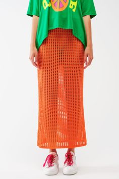 Make a statement with our Maxi Sheer Crochet Skirt in Orange. This stunning skirt is crafted from a blend of 45% viscose, 35% polyamide, and 20% acrylic, offering a comfortable and breathable fit. The bodycon fit and high waist rise enhance your curves and create a flattering silhouette. The midi length adds an elegant touch, while the sheer crochet design exudes boho vibes. The elastic waist ensures a secure and comfortable fit. Our model, with measurements 31-24-35 and a height of 5'10", is we Crochet Maxi Skirt Outfit, Yellow Crochet Skirt Outfit, Midi Skirt Crochet, Crochet Skirt Street Style, Crochet Skirt Beach, Long Mesh Crochet Skirt, Crochet Mesh Beach Skirt, Crochet Skirt Outfit, Orange Skirt