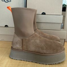 The Classic Dipper Is Legitimately An Autumnal Slay. The Shaft Is A Calf-Hugging Neoprene With A Medial Side-Zipper, The Platform Is A Leg-Lengthening 2 Inches Of Maximalist Joy, And The Inside Is Lined With The Feel Of Ugg From Our Uggplush Lining. The Classic Dipper Is Ready To Support Your Most Authentic Self-Expression. Suede, Neoprene Upper Suede Heel Counter Medial Zipper, Functional Shaft Zippers 17mm Uggplush 60% Upcycled Wool, 40% Tencel Lyocell Lining 17mm Uggplush 60% Upcycled Wool, 4 Shoes Ugg, Authentic Self, Suede Heels, Womens Uggs, Ugg Shoes, Chestnut, Side Zipper, Bootie Boots, Ankle Boots