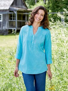 This casual top is cut to fit beautifully and comfortably and features delicate pintucking at the neckline for added polish and endless charm. Additional features include soft gathers at the shoulder, notched neckline with 3 buttons, and 3/4-sleeves with a button cuff that be rolled up and secured with a button tab. Split neckline with pintuck accents Soft gathers at the shoulders 3/4 cuffed sleeves with button tabs Approx. 29" long 100% cotton Machine wash and dry Imported | Perfect Pintuck Cot Tunic Sewing Patterns, Vermont Country Store, Notched Neckline, Linen Blend Pants, Cotton Tunic, Country Store, Women Tunic Tops, Pin Tucks, Womens Tunics