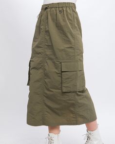 Cargo Skirt With Side Pocket Detail And Rear Slit 100% NYLON MODEL IS 5' 7" TALL, 32" CHEST, 25" WAIST, 35" HIPS AND WEARING A SIZE SMALL IMPORTED. DESIGNED IN THE USA ZIMEGO APPAREL USA BY DOUBLEZERO-BOTTOM United Parcel Service, Short Sleeve Hoodie, Cargo Skirt, Camisa Polo, Bag Dress, Edgy Outfits, Long Hoodie, Pocket Detail, Summer Essentials