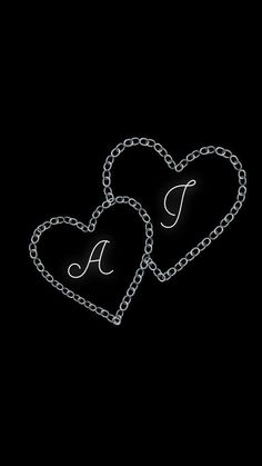 two hearts that are connected to each other with the letter a on them, all in chains