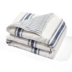 two blue and white striped sheets folded on top of each other