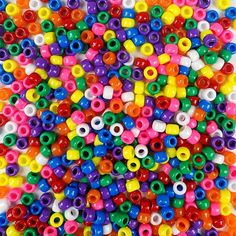 many different colored beads are arranged together