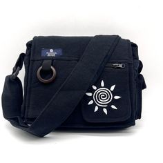 Puzzlestack’s Lukla Black Embroidered Messenger Bag Is A Compact Yet Voluminous Bag. Along With Its Multiple Pockets Used For Storage, It Includes A Large Flap Closure With Velcro. Starting Off With The Two Front Pockets, Open Up The Flap To Find The Main Compartment Following The Large Extra Pocket, And Even A Cute Mini Side Pocket! Make Travel Hands-Free With This Spacious Bag. Express Yourself With 5 Different Hand Embroidered With Thread Designs To Choose From! Not Only Is This Bag Sustainab Everyday Black Embroidered Bag, Casual Black Embroidered Bag, Black Embroidered Cotton Shoulder Bag, Black Embroidered Bag For Daily Use, Black Embroidered Bags For Daily Use, Embroidered Black Satchel Shoulder Bag, Embroidered Black Bag For Everyday Use, Black Embroidered Bag For Everyday Use, Black Embroidered Satchel For Daily Use