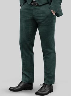 Discover a distinctive interpretation of our Green Pinstripe Pants, where sophistication is elevated to its zenith while reveling in its remarkable versatility. Made from a wool blend material, these pants exude richness and decadence. It comes in a refreshing shade of green adorned with sleek pinstripes that are bound to steal the spotlight. Whether you're in pursuit of the perfect wedding attire, a debonair choice for your groomsmen or an ensemble to turn heads at the racetrack, these pants h Tailored Pinstripe Tapered Leg Pants, Tailored Pinstripe Straight Leg Dress Pants, Tailored Pinstripe Dress Pants With Tapered Leg, Tailored Pinstripe Straight Dress Pants, Pinstripe Tapered Leg Pants For Formal Occasions, Pinstripe Tapered Leg Business Casual Pants, Pinstripe Tapered Leg Business Bottoms, Tailored Tapered Leg Pants With Vertical Stripes, Tailored Pants With Vertical Stripes And Tapered Leg