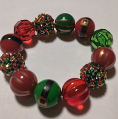 Elastic bracelet with a variety of christmas beads Christmas Beads, Christmas Gingerbread Men, Gum Drops, Christmas Bead, Bubblegum Beads, Christmas Bracelet, Grinch Christmas, Elastic Bracelet, Christmas Gingerbread