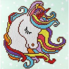 a cross stitch unicorn with stars on the background