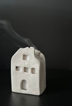 Brighten your cozy space with this handmade ceramic cottage incense burner! Watch as smoke gracefully drifts out of the chimney to make your home feel inviting and magical. A unique way to set the mood! Ceramic Cottage, Sculpey Clay, Set The Mood, Pottery Crafts, Holiday Time, Cozy Space, Incense Burner, Wood Pieces, The Mood