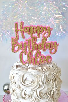 a birthday cake with the words happy birthday choo on it and sparkles in the background