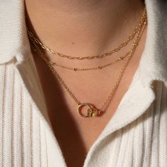 Our 14K Gold-Filled Interlocking necklace is a beautiful sentiment between loved ones, best friends, or mother and child. The charm pendant adds an elegant touch, and the intricate details will make you feel like your look is complete! - 14k gold-filled- Chain width: 2.5 mm.- Small circle 9mm, Large circle: 12.6mm- Chain length: 16" + 2" extension- Waterproof, Tarnish resistant & Hypoallergenic Dainty Link Charm Necklace For Gift, Delicate Chain Gold Plated Charm Necklaces For Mother's Day, Elegant Link Charm Necklaces For Gifts, Elegant Link Charm Necklace For Gift, Gold-tone Link Charm Necklace For Gift, Mother's Day 14k Gold-filled Charm Necklaces With Delicate Chain, Elegant 14k Gold Filled Charm Necklace For Mother's Day, 14k Gold Charm Necklace For Gift, Gift 14k Gold Charm Necklace With Spring Ring Clasp