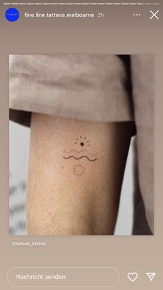 a person with a small tattoo on their leg and the words fine line tattoos melbourne