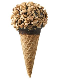 an ice cream cone filled with nuts on top of white background in the shape of a cone