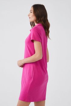 An everyday essential, our polo dress in a brilliant magenta color is an easy and comfortable style for almost every occasion. Whether you are going to the grocery store or a golf session during your vacation, this is the dress you will want to wear again and again. Final Sale - No returns or exchanges. Color- Magenta Pull-over. Polo style. Short sleeve. Side functional pockets. Fabric -40% Cotton. 34% Viscose. 23% Polyester. Care- Machine wash cold, inside out, with like colors. Do not bleach. Casual Summer Polo Dress For Daywear, Casual Collared Neckline Dress With Relaxed Fit, Spring Casual Polo Dress For Daywear, Casual Spring Polo Dress For Daywear, Casual Spring Daywear Polo Dress, Casual Spring Polo Dress, Spring Collared Polo Dress For Daywear, Collared Polo Dress For Spring Daywear, Casual Collared Polo Dress In Cotton