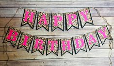 leopard print happy birthday banner with pink and black cheetah on the bottom,