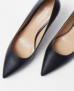 Step into elegance with the Ann Taylor Daphne Leather Pumps, where classic style meets modern refinement. These pumps are designed to enhance your ensemble with their sleek, updated silhouette featuring a longer, pointy toe and a more subtle curve at the heel.

- Size: 7
- Color: Black
- Material: Leather
- Gender: Female
- Heel Height: 2 1/2 inches

Crafted for comfort and style, the Daphne Pumps include a padded footbed ensuring you can wear them from day to night with ease. Perfect for both p Black Snip Toe Heels For Work, Black Pointed Heels For Work, Knitted Suit, Detail Shop, Designer Heels, Leather Pumps, Office Wear, Egift Card, Effortless Style