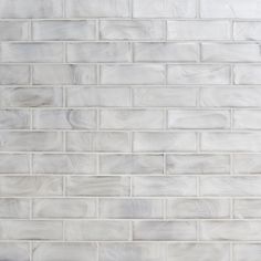 a white brick wall that is made out of wood