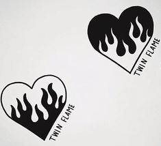 two heart shaped stickers with flames and words on them, one saying i love my flame