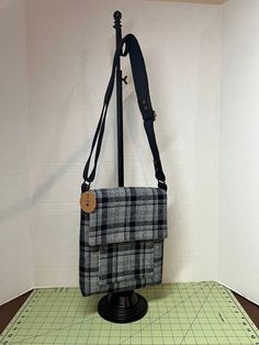 Grey plaid flannel with plenty of body to carry your essentials . Soft and roomy , the perfect Fall or Winter bag . Casual Plaid Bag With Adjustable Strap, Casual Plaid Bags For Fall, Casual Plaid Shoulder Bag With Adjustable Strap, Plaid Rectangular Bag For Fall, Plaid Bags For Everyday Use In Fall, Casual Plaid Travel Bag, Plaid Bags With Adjustable Strap, Plaid Bags With Adjustable Strap For Everyday Use, Plaid Satchel Bag For Everyday Use