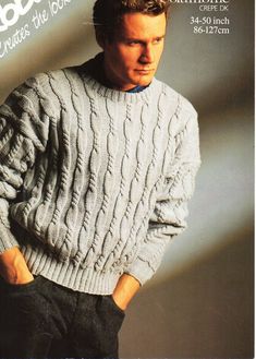 a man is wearing a sweater and posing for the cover of an issue of men's knitting magazine