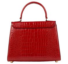 Handmade in New York, the Elene bag is crafted with lipstick red Italian crocodile embossed leather. Features cranberry patent piping, signature bow detail, gold hardware, and a magnetic snap closure. Elegant Red Bag With Glossy Finish, Red Glossy Formal Bags, Formal Red Bags With Glossy Finish, Formal Red Bag With Glossy Finish, Classic Red Bag With Glossy Finish, Lipstick Red, Bow Detail, Emboss, Embossed Leather