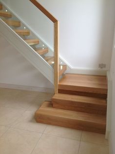 the stairs are made of wood and have been painted white