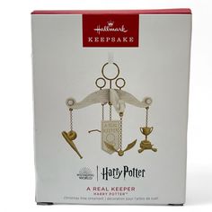 a harry potter themed keepsake box with an image of the hammer and scale on it